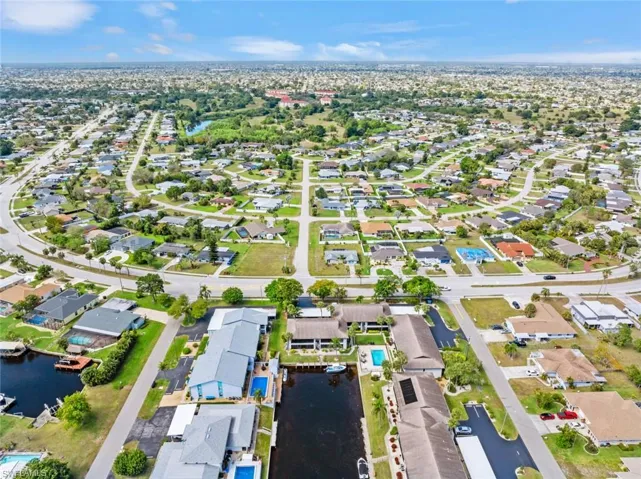 Aerial view with a residential view and a water view