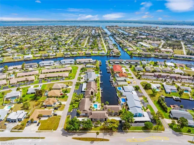 Bird's eye view with a water view and a residential view
