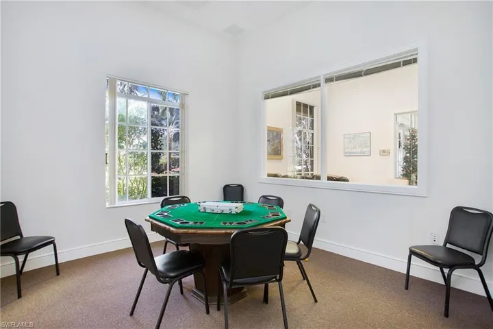 Playroom with carpet flooring and baseboards