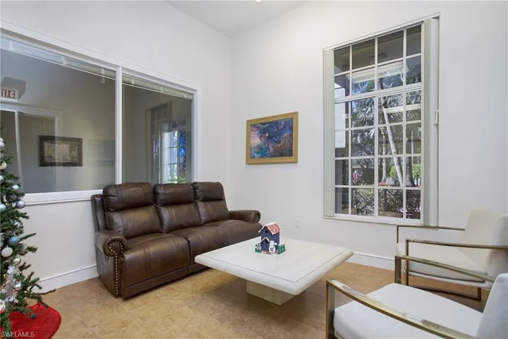 Living room featuring baseboards