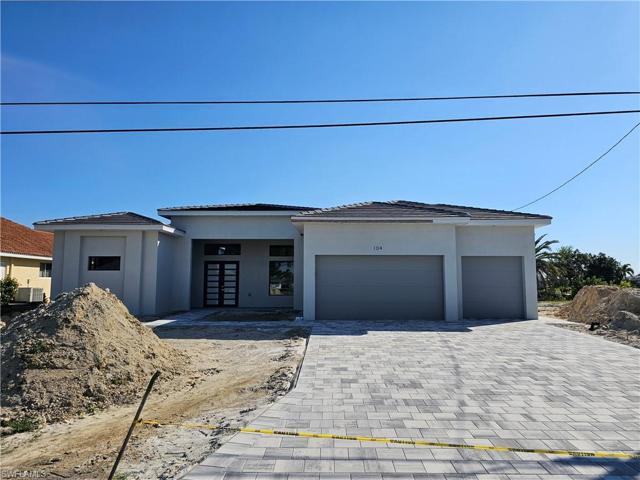 New home to the left of the property