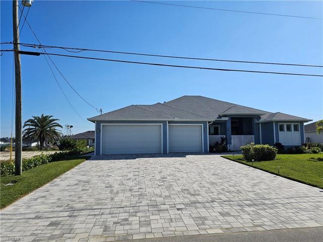 New home to the right of the property