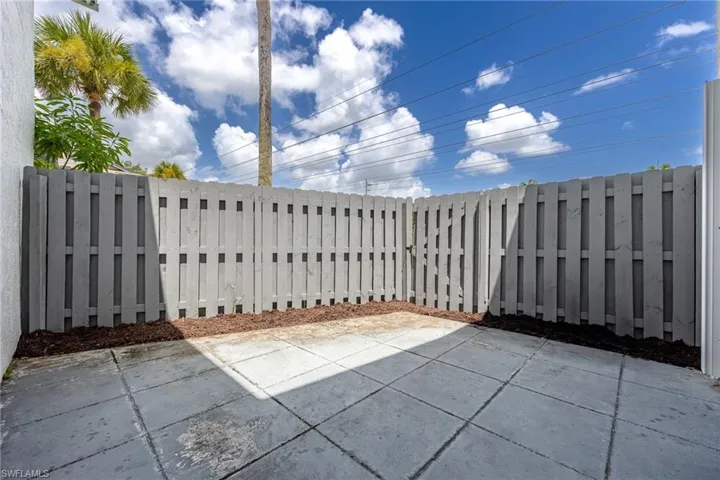Fenced backyard featuring a patio area