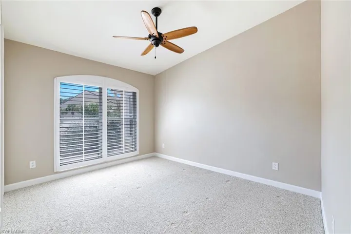 GUEST BEDROOM WITH UPGRADED CEILING FAN & CARPET