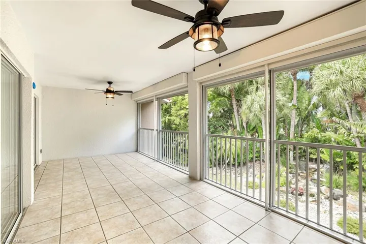 A VIEW OF THE WATER FEATURE BELOW FROM THE LANAI