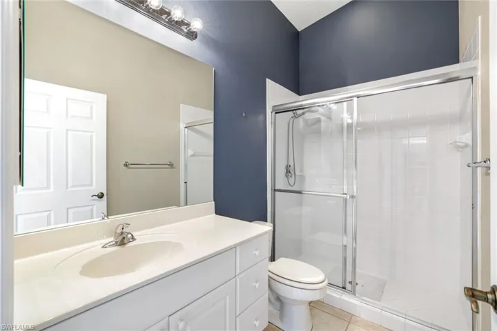 GUEST BATH WITH VANITY, SINGLE SINK AND SHOWER