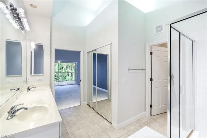 MASTER BATH WITH A SPACIOUS WALK IN CLOSET AND SHOWER