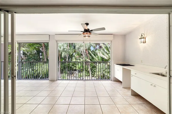 SPACIOUS LANAI 11'X27' FOR EXPERIENCING LEISURE TIME & ENTERTAINING. A CONVENIENENT SUMMER KITCEN HAS A DUAL ELECTRIC GRILL AND SS SINK.