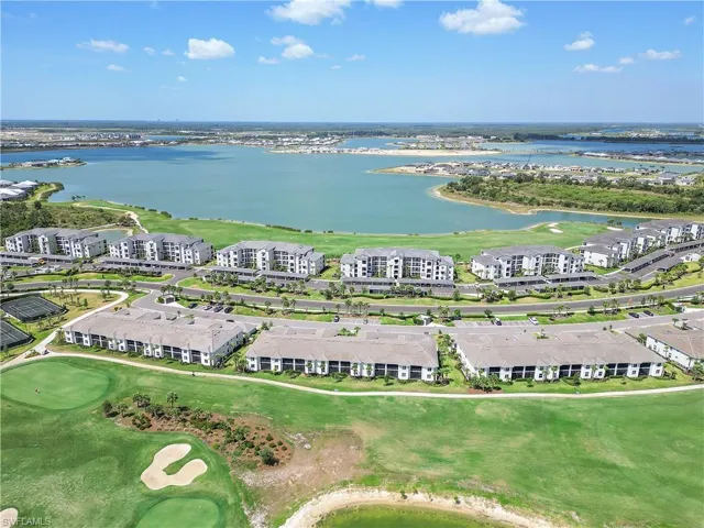 Aerial view of a large body of water and a golf course