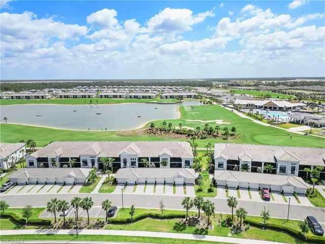 Aerial view of a local golf course and a large body of water