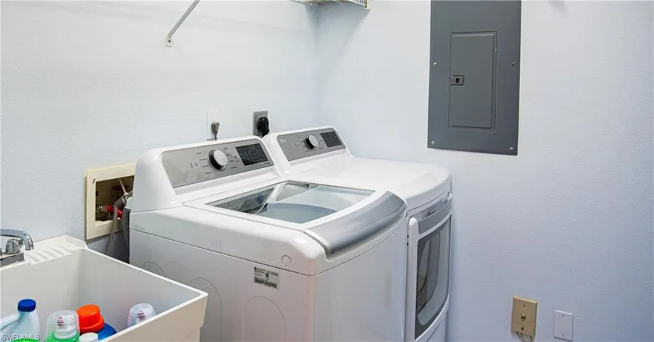 Laundry area with sink