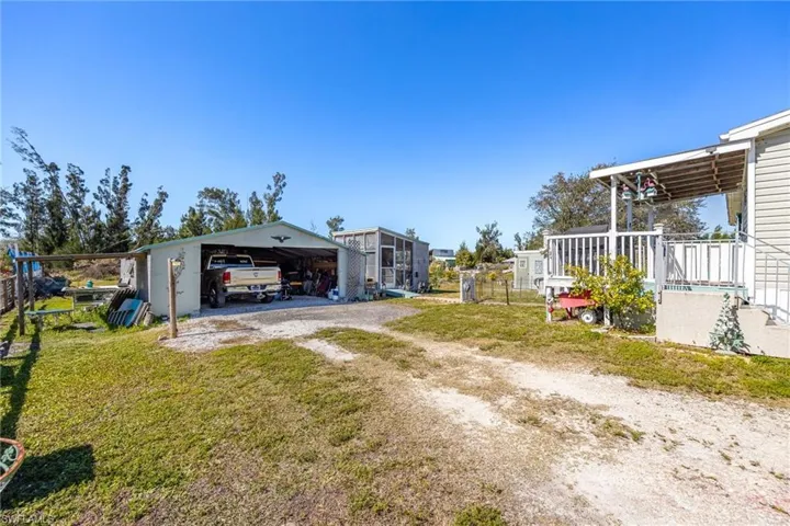 Plenty of open parking spaces and covered. Garage has work spaces, water, and power.