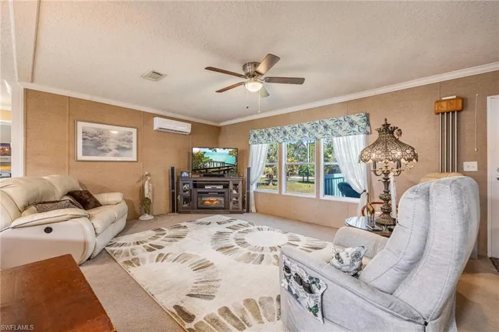 From the entrance, you see the Living room, Kitchen, and Dining combo. Split floor plan. Master to the left and Beds 2&3 to the right.