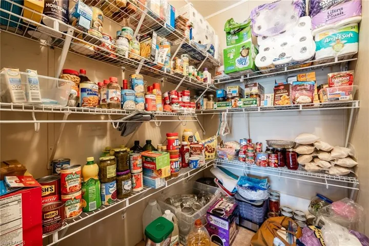 This is the huge walk in closet for bedroom #3. Seller is currently using it for extra pantry storage, but there is Pantry in the Kitchen as well as extra storage in the Laundry room.