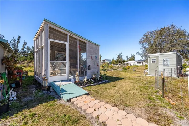 This is a fun space to be outside and do crafts or hobbies or just enjoy the country. Powered and screened for maximum enjoyability.