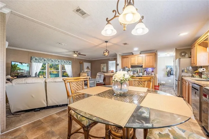 Dining, Living, and Kitchen combo in the main hub of the home.
