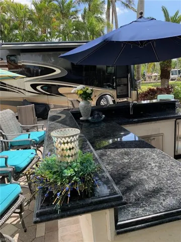 View of patio / terrace with a sink and an outdoor kitchen
