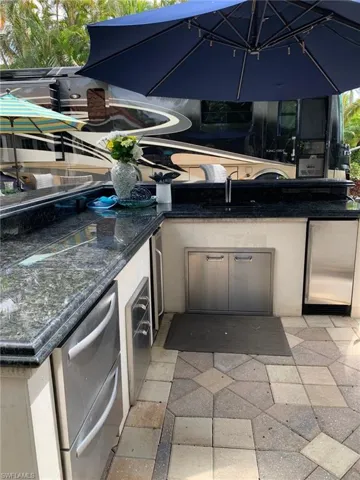 View of patio / terrace with an outdoor kitchen