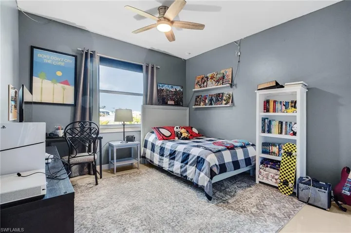 Bedroom featuring ceiling fan