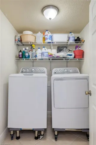 Dedicated utility space featuring overhead wire shelving