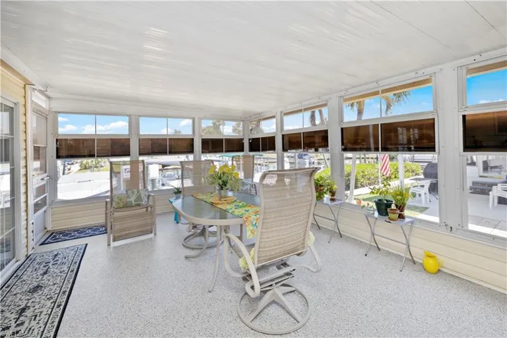 Spacious Florida Room with Epoxy Floors and Windows