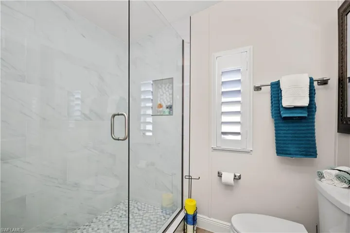 Tiled Shower and Glass Shower Doors