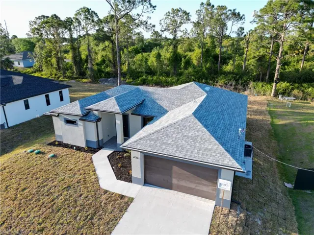 Aerial view of property and surrounding area