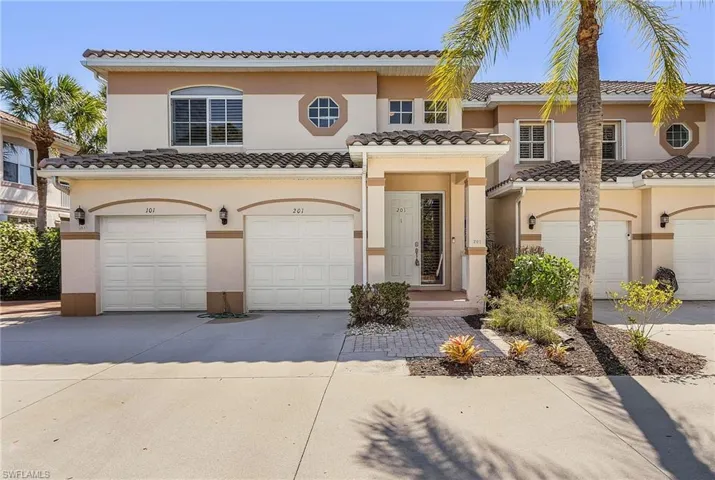 Mediterranean / spanish-style home featuring driveway, an attached garage, stucco siding, and a tile roof