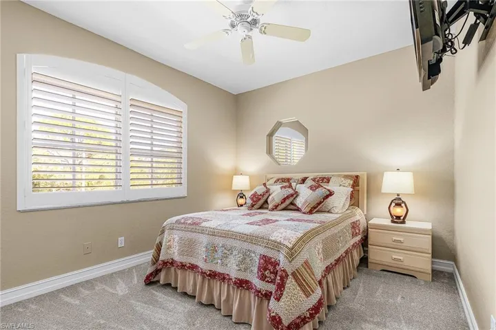 Bedroom featuring carpet flooring and a ceiling fan