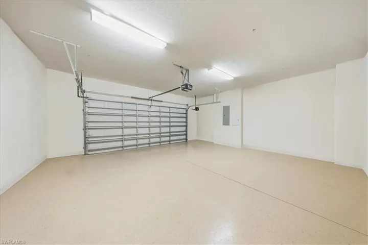 Garage featuring electric panel