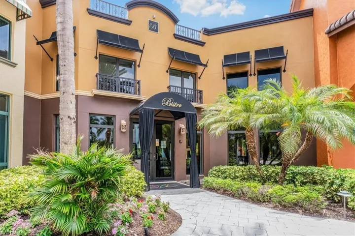 View of exterior entry featuring stucco siding