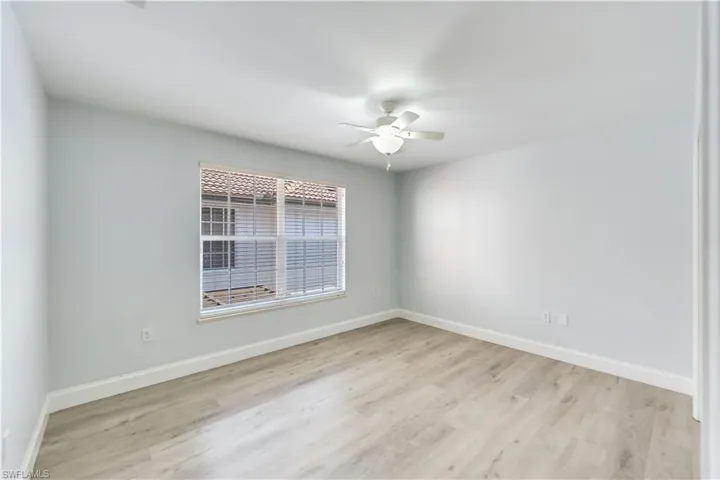 Guest Bedroom with large closet and window.
