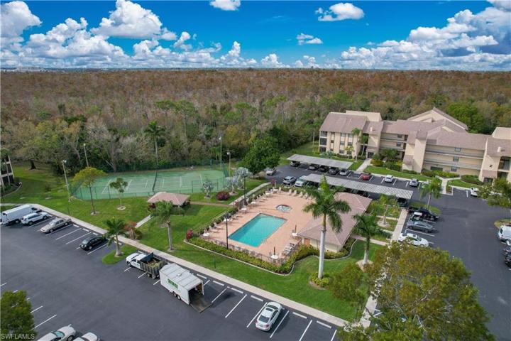 Pool and courts next to unit.