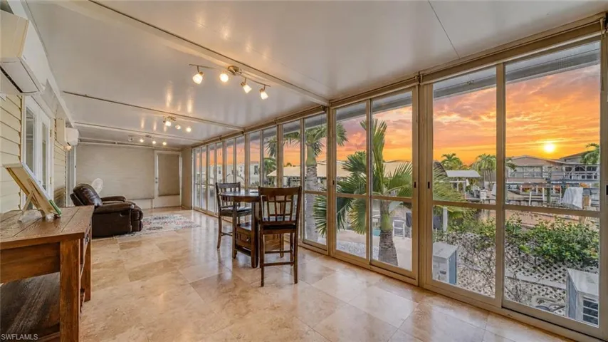 Enclosed Florida Room to Enjoy Water Views and Sunets