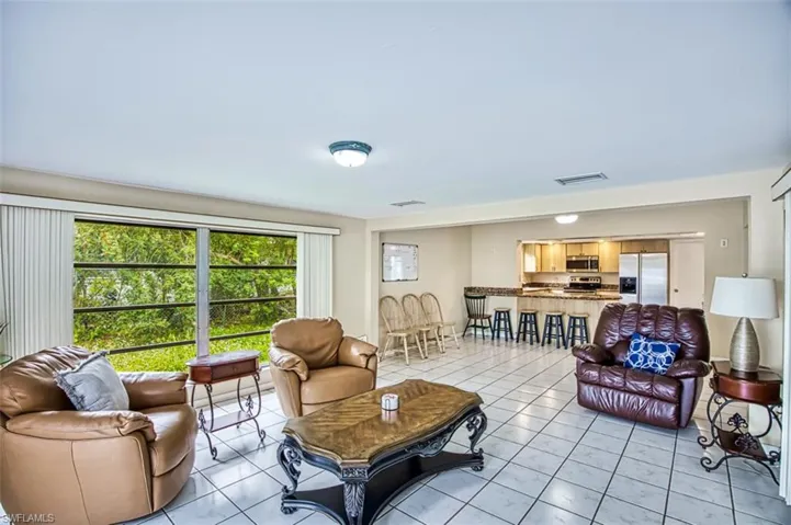 Famly room, dining room and view of kitchen