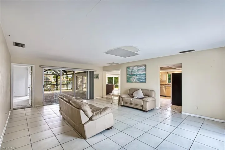 As you walk in front door, large living/dining area with tile flooring