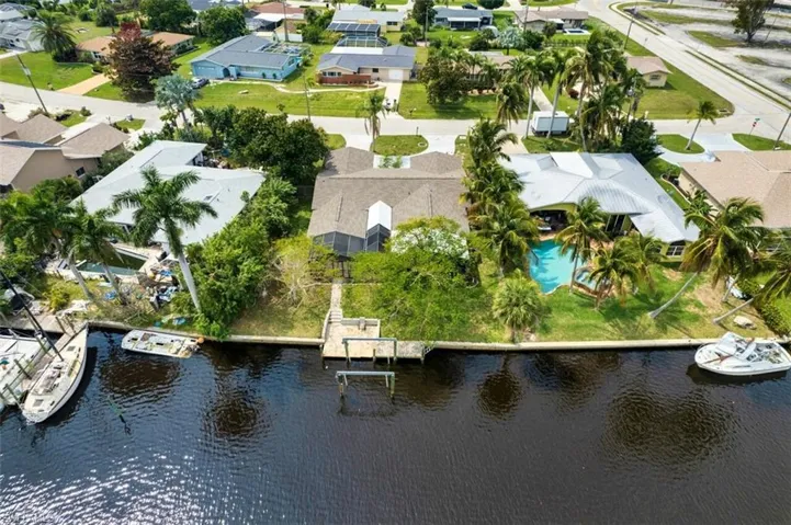 Aerial view of rear of home | dock & 10,000 lbs boat lift