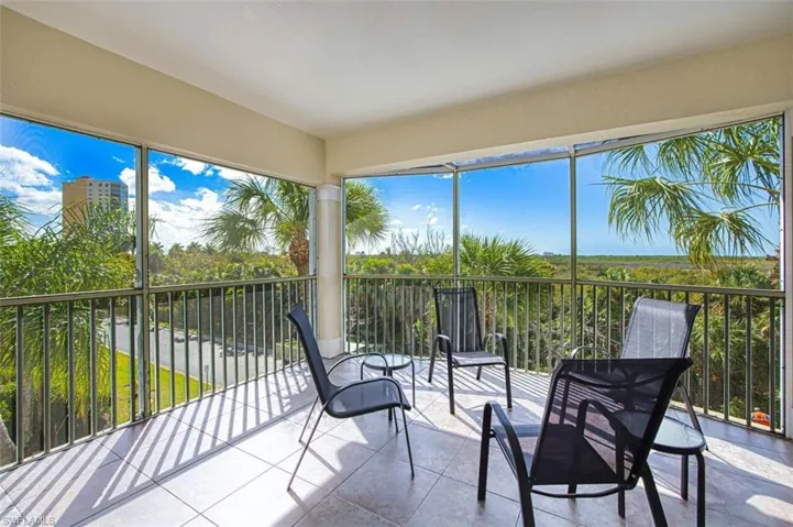 Sunroom with tile patterned floors