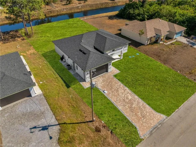 View of subject property featuring a large body of water