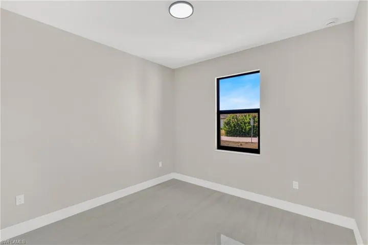 Empty room with baseboards