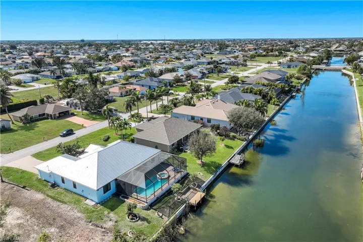 Aerial view of residential area featuring freshwater canal