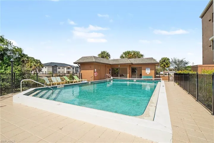 Community pool with a patio area