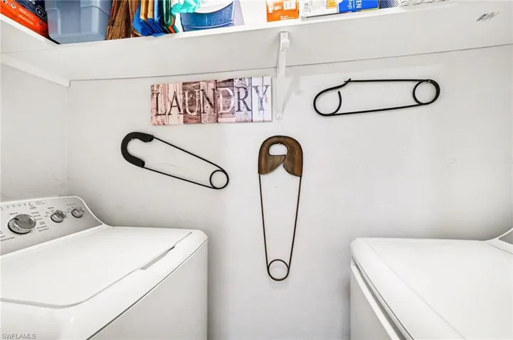 Laundry area featuring independent washer and dryer