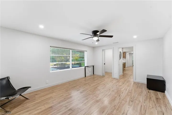 Unfurnished bedroom with light wood-style floors, recessed lighting, a ceiling fan, and a closet