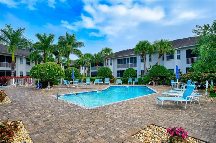 COMMUNITY POOL NESTLED IN THE MIDST OF CARRIAGE HOMES