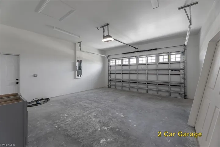 Unfurnished bedroom with ceiling fan and light hardwood / wood-style floors