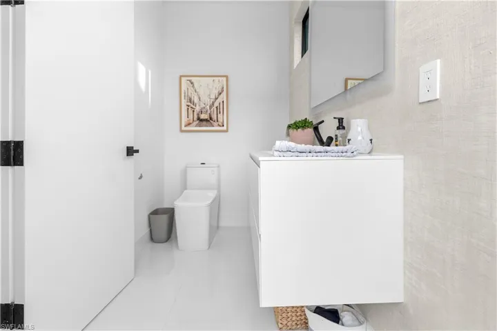 Bathroom featuring vanity and tile patterned flooring