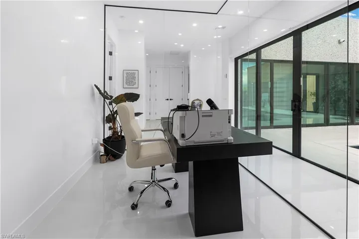 Office area with recessed lighting and baseboards