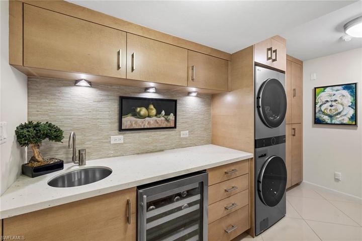 Laundry Room with Wine Fridge and 2023 Washer/Dryer