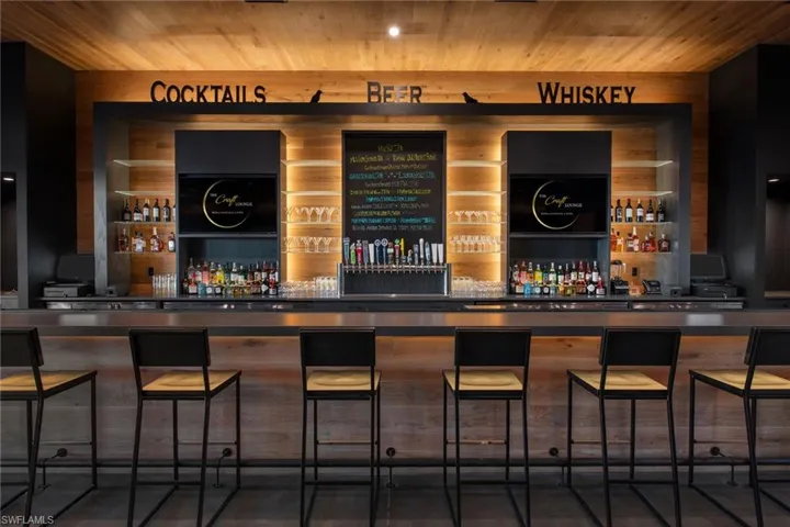 Bar featuring wooden ceiling